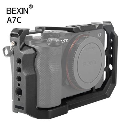 China Professional Support BEXIN Camera CNC Tripod Quick Release Plate Bracket Adapter DSLR Camera Mount Stabilizer Cage For Sony A7C Cameras for sale