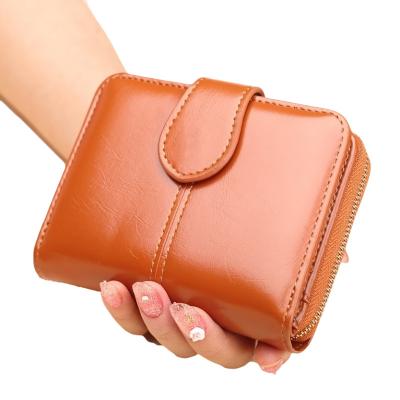 China New Oil Wax Coin Fashion Leather Short Hot Anti-theft Small Purse Women's Casual Wallet Oil Leather Clutch for sale