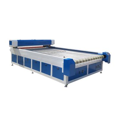 China Laser CUTTING Double Heads Automatic Feeding CO2 Laser Cutting Industrial Filter Cloth Laser Cutting Machine for sale