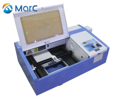 China Laser Engraving New Model Small Size Laser Engraving Machine 2030 With Water Cooling for sale