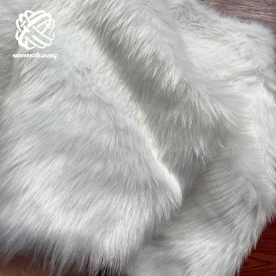 China Amazon Selling Faux Fur Fabric Auto Warm White Faux Fur Long Pile Faux Fur Material Fabric For Christmas for sale