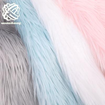 China Long Pile Faux Fox Fur Auto Running Pink Imitation Fur Lot Upholstery Faux Acrylic Fur Fabric for sale