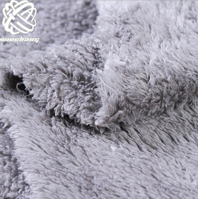 China Automatic Solid Color 100 Polyester Fabric Faux Fabric Wholesale Soft Upholstery Cotton Fur Fabric Hometextile Fur for sale