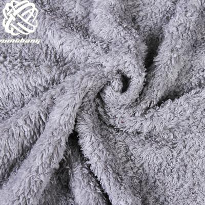 China Auto Upholstery Amazon Sale 100% Warm Fleece Faux Fur Fabric Polyester Fabric Home Textile Plush Fur for sale