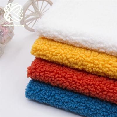 China Auto Upholstery China Supply Teddy Curly Pile Fur Fabrics Direct Faux Fur Fabric For Garment Auto Upholstery for sale