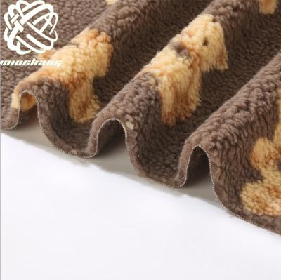 China Auto Upholstery Factory Bear Pattern Printed Curly Faux Fur Teddy Faux Fur Plush Fabric For Garment Home Textile for sale