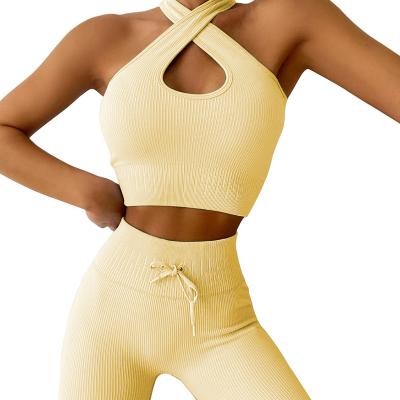 China Breathable Soft Stretch Sustainable Training Active Wear Ribbed Knitted Seamless Yoga Leggings 2 Piece Workout Women Fitness Clothing Sets for sale