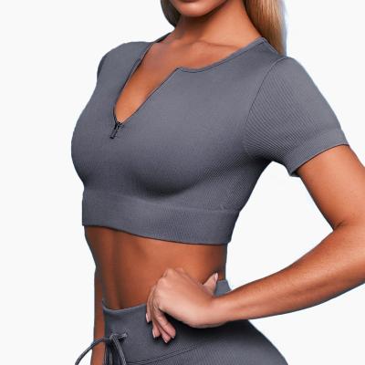 China Wholesale High Quality High Stretch Sports Fitness Yoga Short Sleeve Chest Seamless Knitted Zipper Women's Short Sleeve Tops for sale