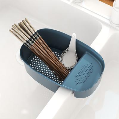 China Sustainable Home Kitchen Sink Residue Filter Saddle Shaped Drain Basket for sale