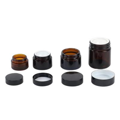 China Face Cosmetic Eye Cream Jar 20ML Round ABS Black Screw Cap Lid Cosmetic Cream Amber Glass Jar for sale