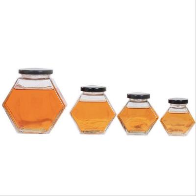 China Factory 100ML 180ML 280ML 380ML Hexagonal Clear Lid Iron Glass Bird's Nest Bottle Sealed Thickened Honey Bottle for sale