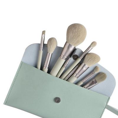 China High Quality Green Wooden Skin Friendly 12 Pcs Matcha Handle Makeup Brush Set Premium Face Cosmetic Brushes With Portable PU Leather Bag for sale