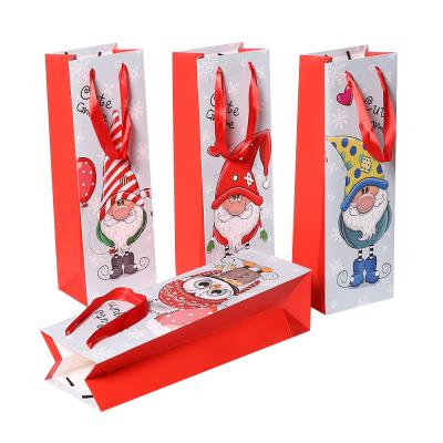 China Recyclable Customized Christmas Print Bottle Gift Bag In Stock Wine Carrier Christmas Wine Packaging Bag for sale