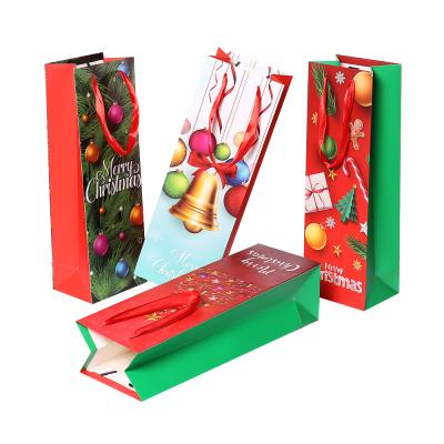 China Recyclable Cheap Customized Christmas Paper Wine Bottle Gift Bags Reusable Present Christmas Wine Bag for sale