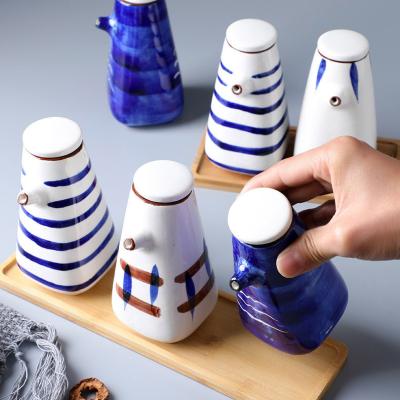 China Grass & Spice Tools Custom Handmade Ceramic Oil Dispenser Set Kitchen Condiment Serve Bottle Seasoning Vinegar Olive Oil Condiment Bottle for sale