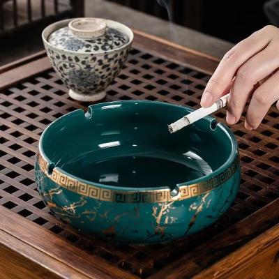 China Office Luxury Custom Logo Hotel Bar Eco-Friendly Ceramic Ash Tray Round Large Black White Cigar Ashtray for sale