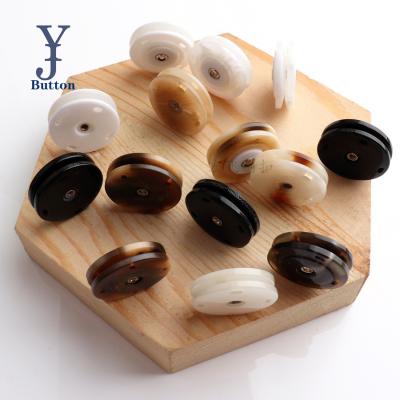 China Stain 25mm nickel free resin button dark color is used for coat anorak mother button shell button pearl wool buckle for sale