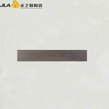 China Glazed Living Room Floor Tiles 6x36 Inch Dark Grey Wood Look Porcelain Tile for sale