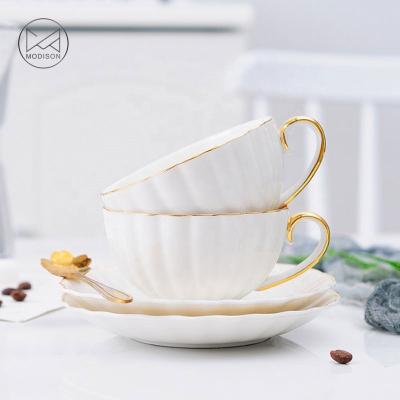 China Viable Modern Ceramic Porcelain Tea Coffee Cup Saucer Set Chrysanthemum Shape Tea Cup Set for sale