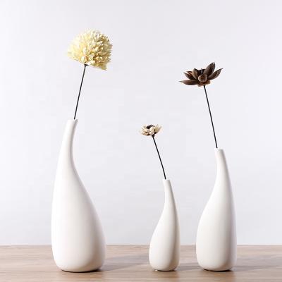 China New classic/postmodern style Nordic simple water drop white curved dry vase ceramic vase ornaments flower arrangement for sale