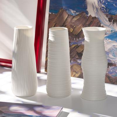 China Modern Minimalist Textured White Ceramic Vase Art Flower Vase Nordic Classical Home Vase for sale