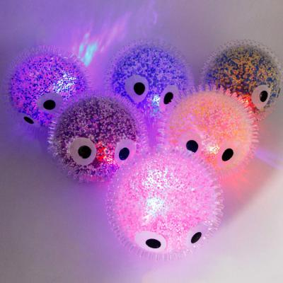 China 2022 High Quality Hand Squeezed Ball Toy Flashing Squeeze Elastic Luminous Glowing Ball Big Eyes Squeeze Luminous Decompression Elastic Luminous Glowing Ball for sale