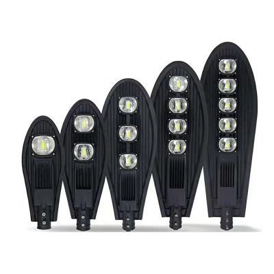 China ROAD promotion outdoor cob led street light with round twin tennis shoe box lamps from SHCET for sale