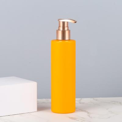 China Non Spill China Made Bottle Gold Lotion Pump UV Coating Plastic Pump Dispenser 24mm 28mm for sale