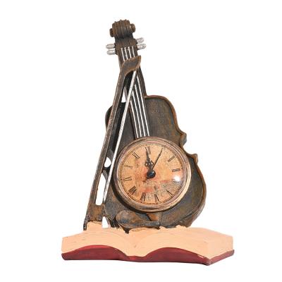 China Custom Europe Moq Violin Clock Shape Low Stone Figurine Powder Resin Europe With Clocks for sale