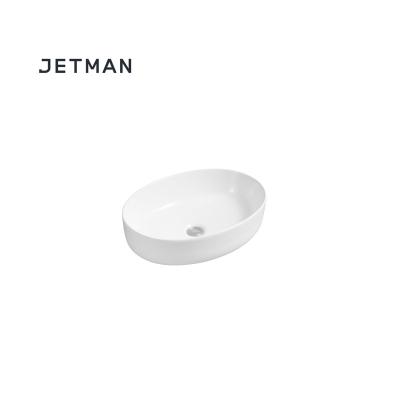 China JM7853 Premium Stylish Ceramic Material Hotel Or Home Modern Art Hand Wash Bathroom Oval Basin for sale