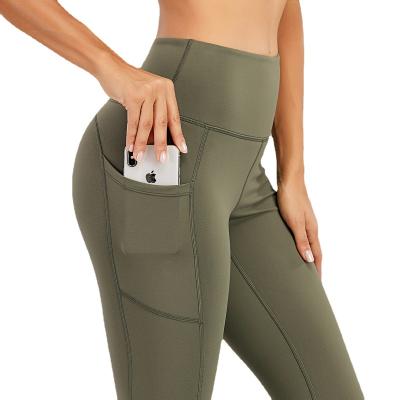 China 2022 Latest Custom Lightweight High Waisted Gym Gaiters Polyester Yoga Pants With Pockets For Women for sale