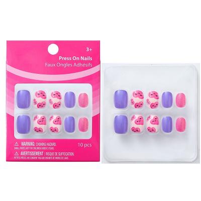 China Design Solid Color Artificial Nails Love Hearts And Donut Color Patterns Press On Stick Fake Nails for sale