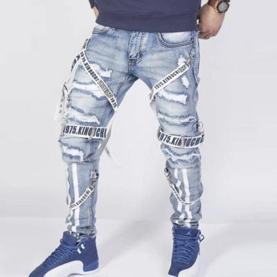 China Color Fade Proof yard - JS fashion stylish men's designer skinny jeans with ribbons tattered zipper stacked jeans men for sale