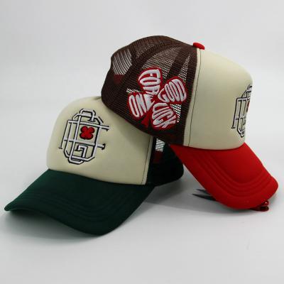 China JOINT sublimation printed blast printed logo foam grid embroidered trucker cap hat for sale