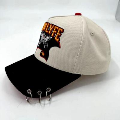 China 100% Custom Cotton 3D embroidery logo baseball cap Sports factory metal wholesale Decorative ring baseball cap for sale