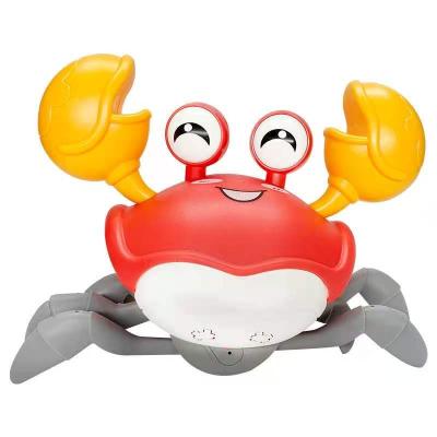 China Mini Animal Model Voice Controlled Music Crab Electric Crawling Mini Plastic Animal Toy for sale