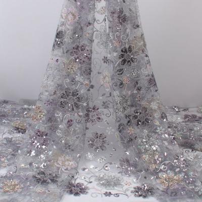 China New Mesh Wedding Dress Sequins Bead Tube Embroidery Viable Fabric Fashionable Bridal Dress Lace Fabric for sale