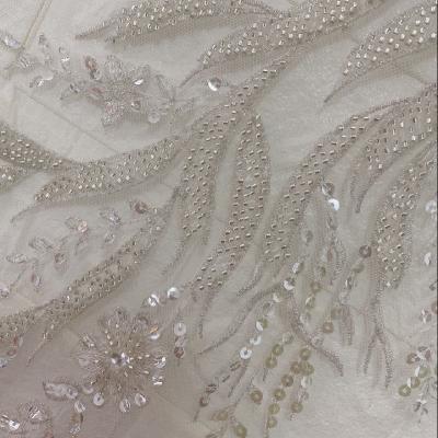 China Viable Luxury Handmade White Heavy Beads Flower Embroidery Wedding Dress Lace Applique DIY Sewing Patch for sale