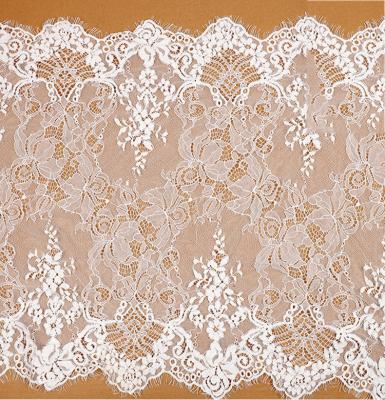 China Newest Design Handmade Embroidery Handmade Nigerian African Flower Wedding Party French White Hollow Lace Fabric For Women for sale