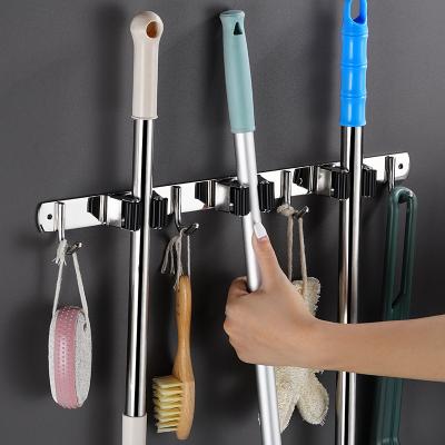 China Upgraded Viable 3 Racks 4 Hooks Stainless Steel Hanging Wall Mount Hanger Storage Tools Wipe Broom Holder for sale