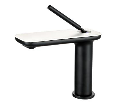 China Modern Unique Design Black Brass Bathroom Basin Faucet With White Rock Plate Waterfall Basin Mixer Tap for sale