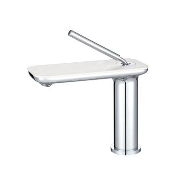 China Modern Unique Design Brass Chrome Bathroom Basin Faucet With Rock Plate White Waterfall Basin Mixer Tap for sale