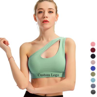 China Wholesale Sports Bra One Shoulder Support Women Breathable Hollow Running Yoga Compression Underwear Dance Top for sale