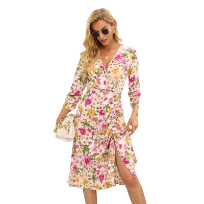 China Anti-Wrinkle Designer Custom Elastic V-Neck Side Slit Pleated Floral Midi Dress For Women for sale