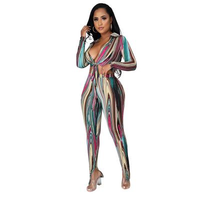 China Supplier Women Graphic Printing Anti Pilling Elastic Deep V-Neck Crop Shirt Tied Up Pant Leg Split Two-Piece Set for sale