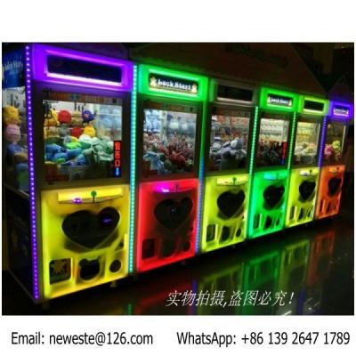 China luminous Heart Pattern Glitter Colorful illuminated Coin Operated Arcade Games Doll Cranes Claw Machine for sale