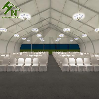 China 25x30m 25x40m Large TFS Curve Marquee Hot Galvanized Aluminum 25x50m Tent For Events Event Center for sale