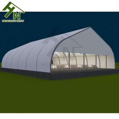 China Hot Dip Galvanized Premium Permanent Event Curve Tent For Outdoor Event For Sale /25x60m Event Exhibition TFS Tent for sale