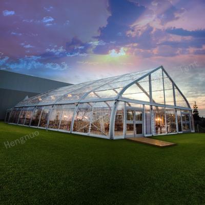 China Waterproof / Fire / Flame Restardant 15x25m Promotional Frame TFS Curve Tent With Clear Roof For Wedding Party for sale