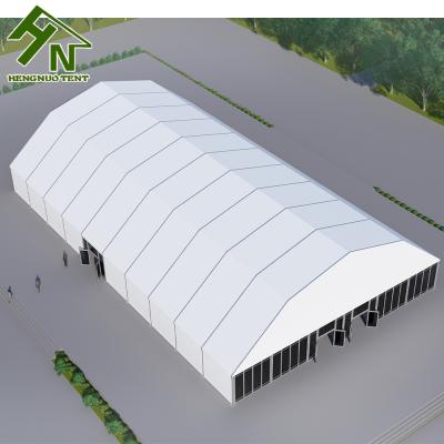 China 2021 Hot-dip Galvanized Exhibition Wedding Hall Party Banquet Marquee Trade Show Polygon Glass Tent 30x60m For Sale for sale